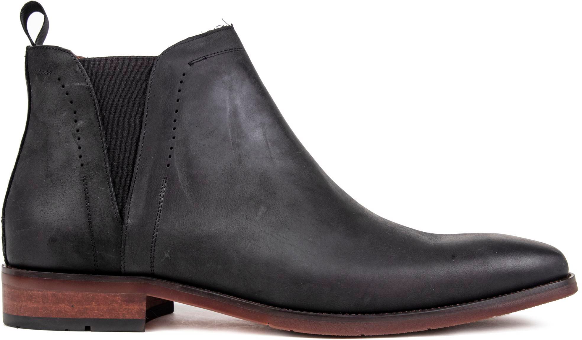 Black chelsea boots with brown sole hotsell