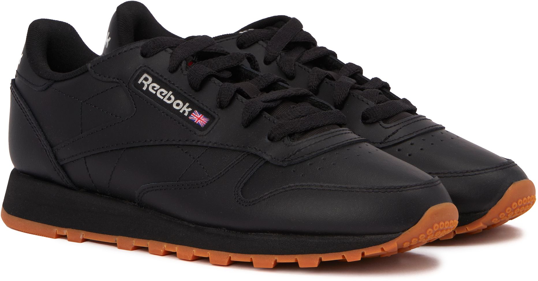 Reebok black leather trainers online